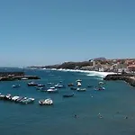 Acogedora En *